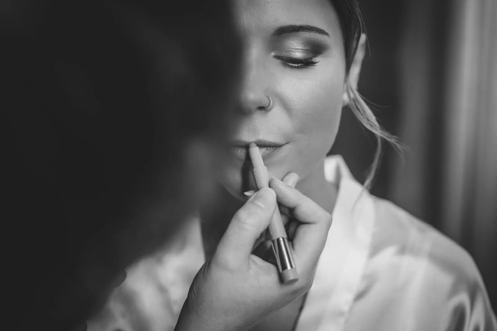 Bridal lipstick in black and white during preparations in Padua